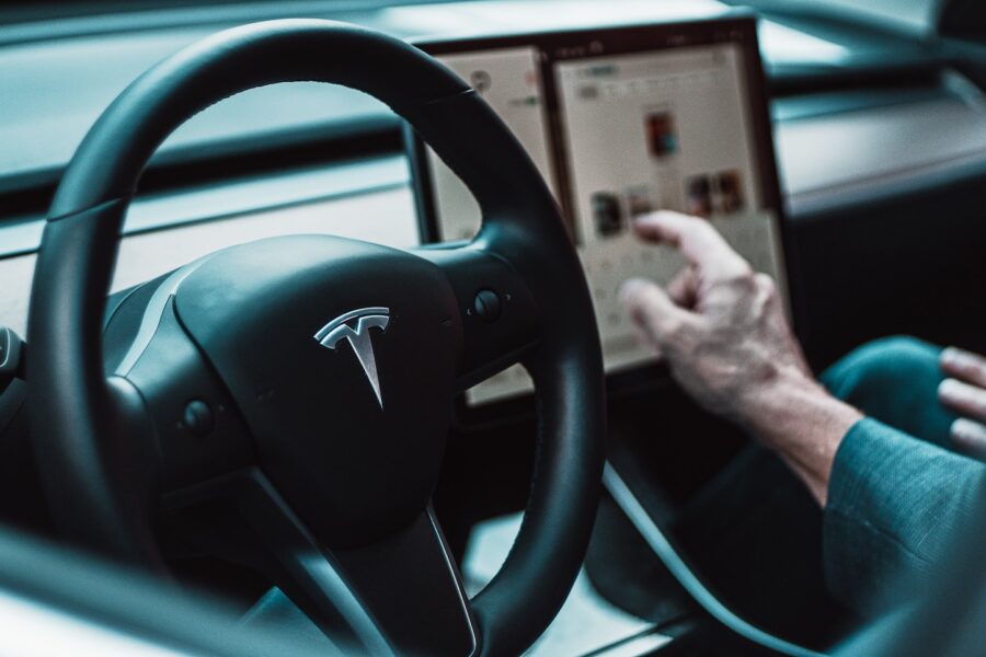 black Tesla steering wheel