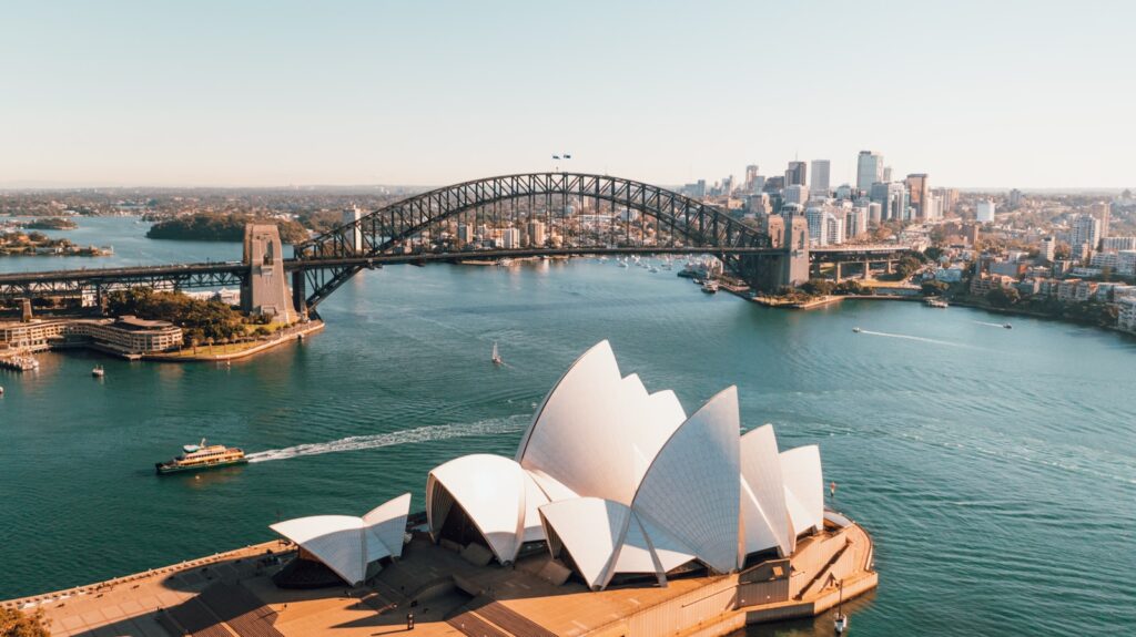 sydney opera house near body of water during daytime