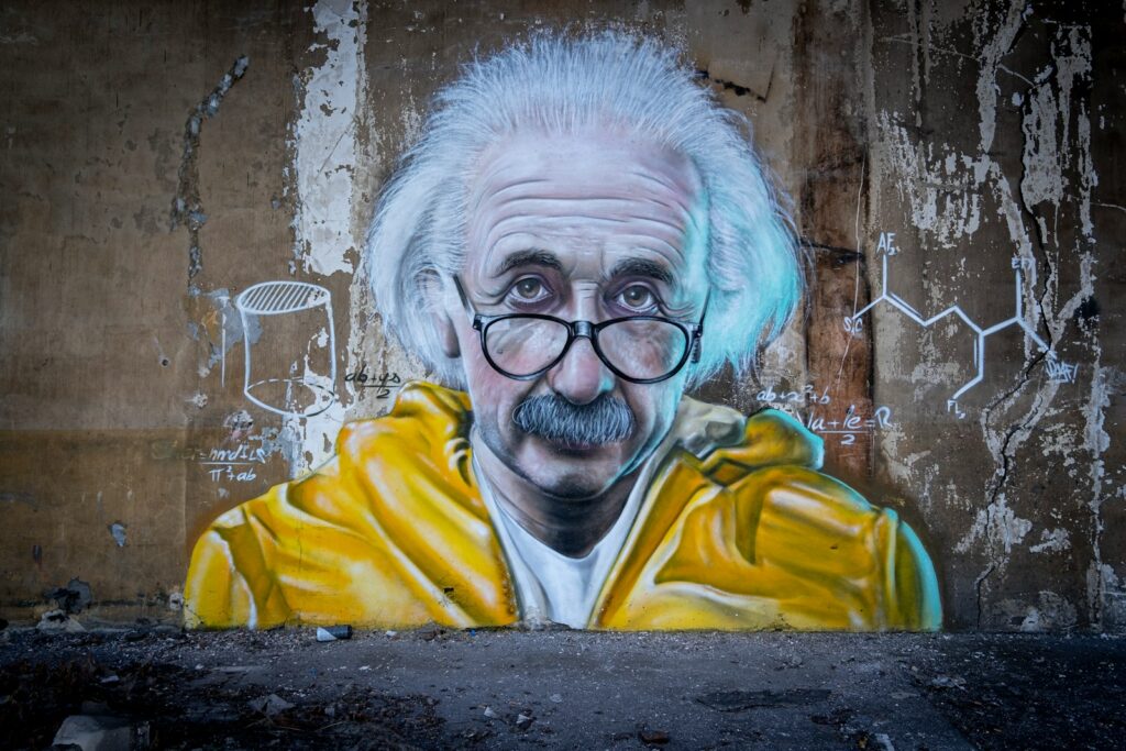 man in yellow and blue hoodie wearing eyeglasses