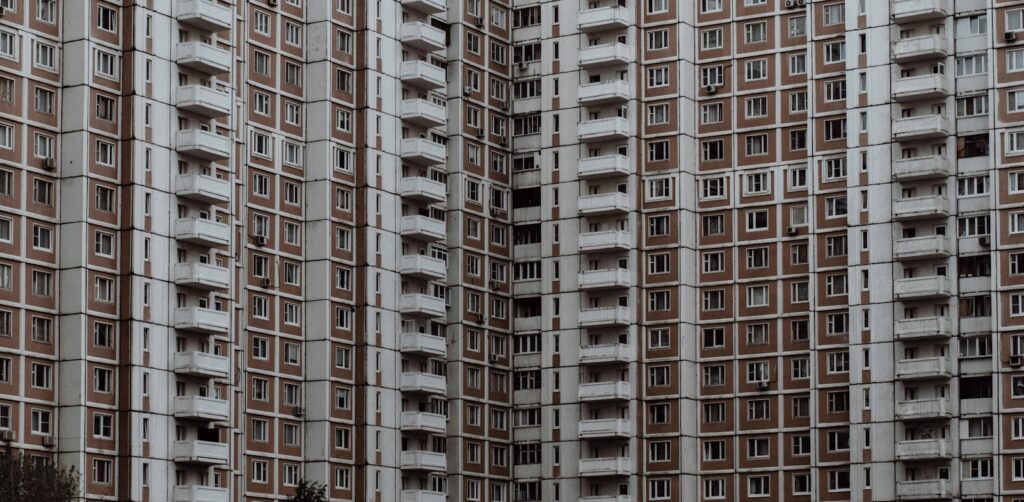 brown and white high-rise concrete building